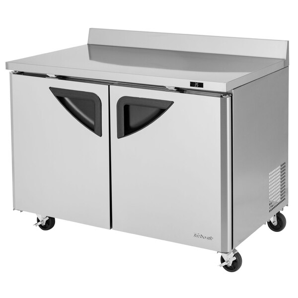 a stainless steel refrigerator with wheels