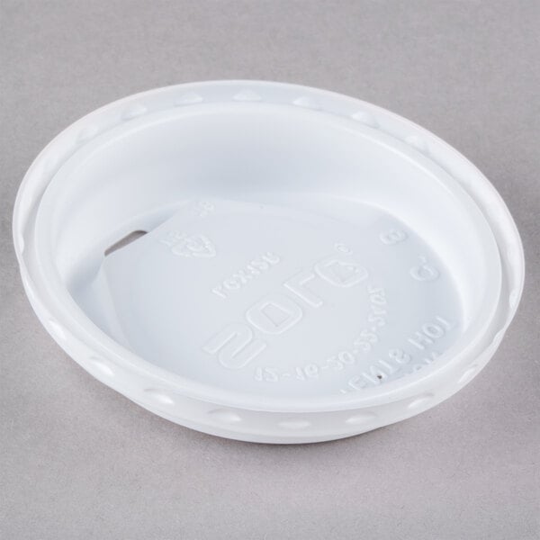 A white plastic Solo lid with a hole and text that reads "The Gourmet Lid" and "LGXW2-0007"