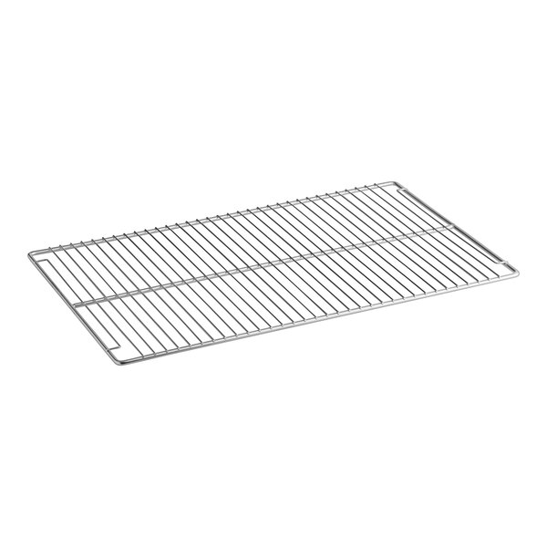 A stainless steel shelf with a grid on it.