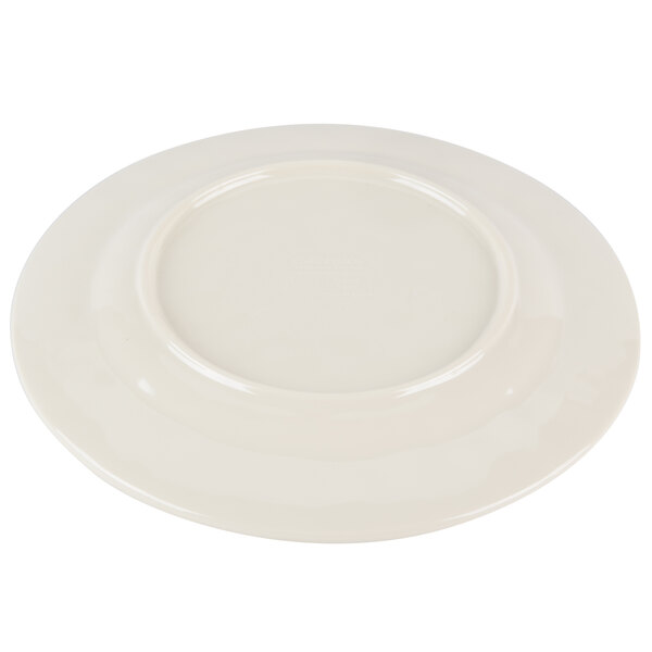 A white Carlisle melamine bread and butter plate with a round rim.