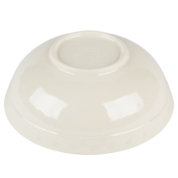 A white Carlisle melamine bowl.