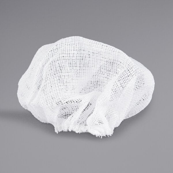A white mesh Royal Paper lemon wedge bag.