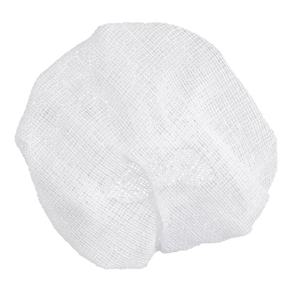 A loosely woven, white mesh fabric gathered into a round shape.