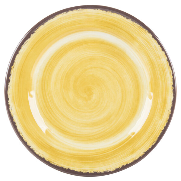 A yellow Carlisle melamine bread and butter plate with a swirly circle design.