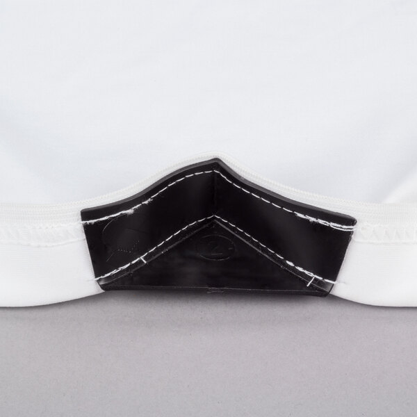 A white Snap Drape Contour Spandex table cover.