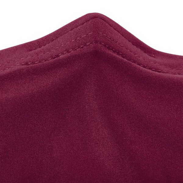A burgundy Snap Drape spandex table cover.