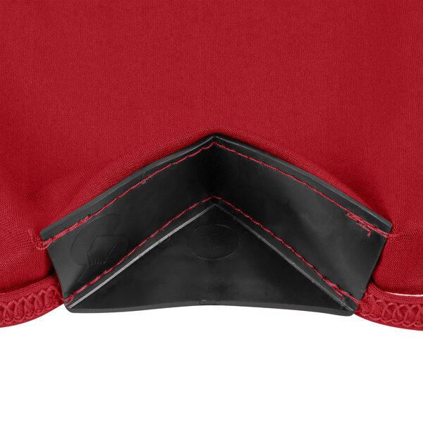 The red spandex corner of a Snap Drape Contour Table Cover.