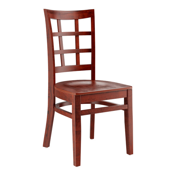 A Lancaster Table & Seating mahogany wood chair with a window back and mahogany wood seat.