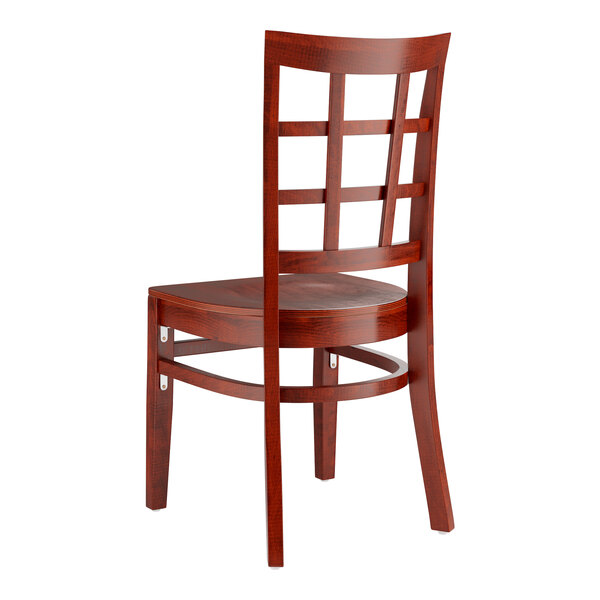 A Lancaster Table & Seating mahogany wood chair with a window back and mahogany seat.