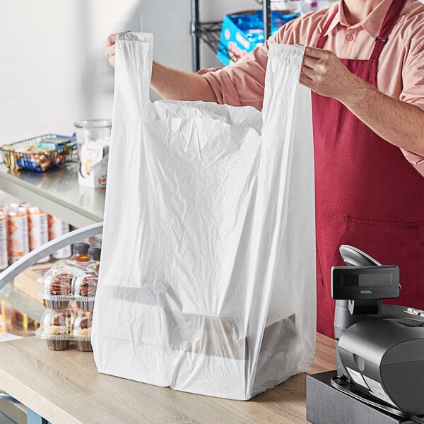 Choice 1/10 Size .55 Mil White Unprinted Embossed Medium-Duty Plastic  T-Shirt Bag - 1500/Case