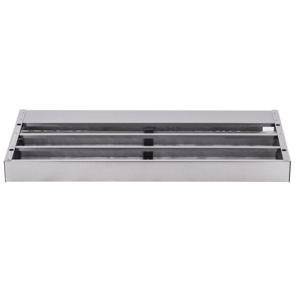 An Avantco stainless steel grille with four sections.