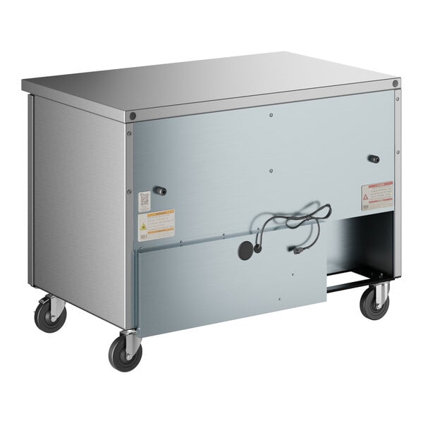 A stainless steel True undercounter freezer on wheels.
