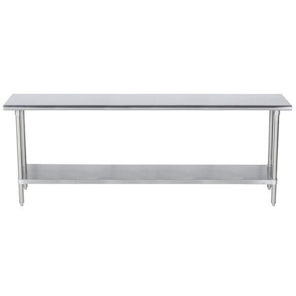 A long stainless steel work table with a stainless steel undershelf.