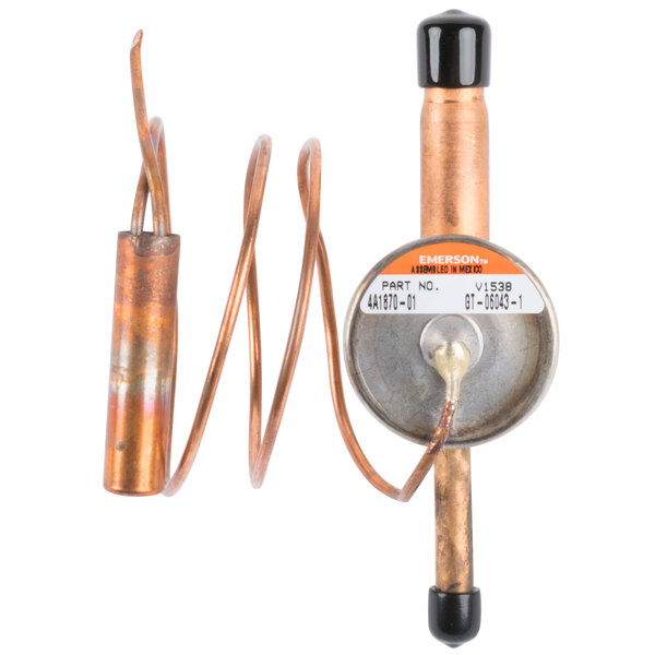 A close-up of a copper expansion valve for a Hoshizaki R-404A system.