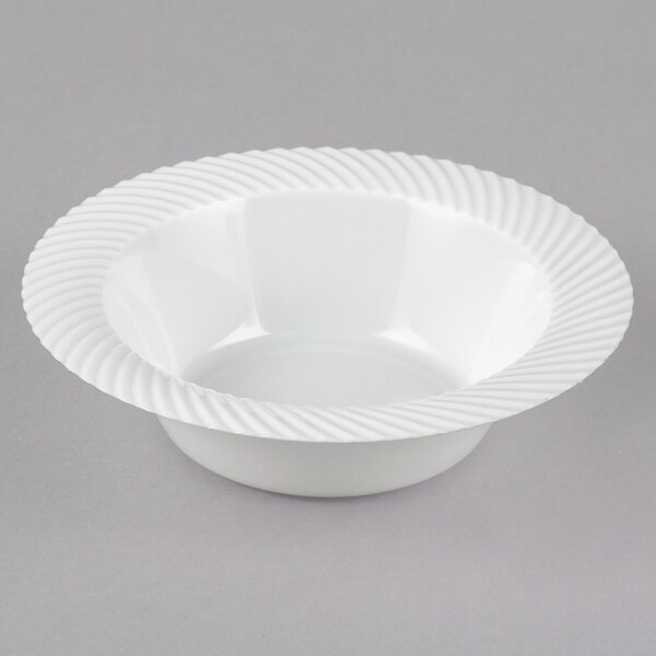 A white Visions plastic bowl with a wavy design.