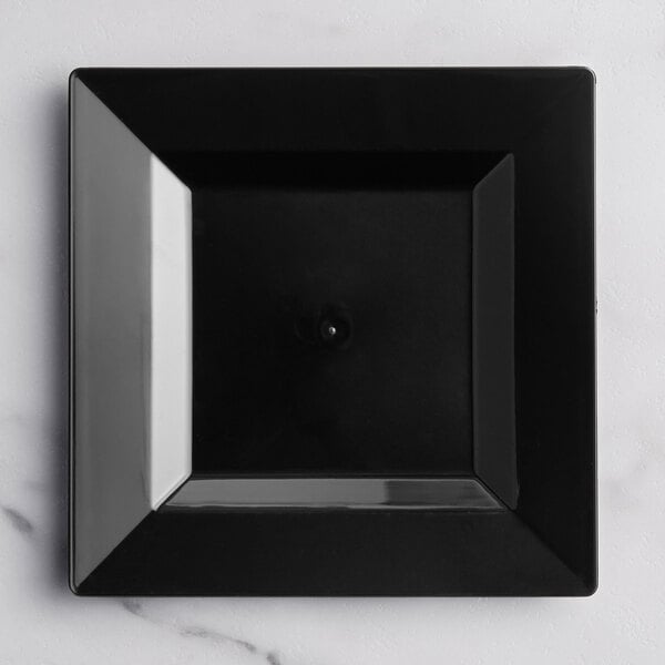 A Visions Florence black square plastic plate with a white border.
