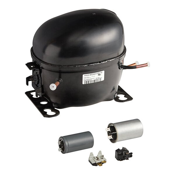 A black Turbo Air refrigeration compressor with wires and a white label.
