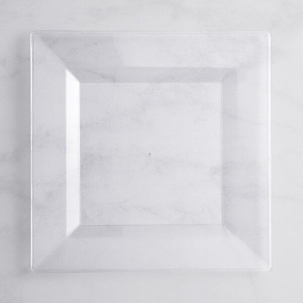 A clear square plate with a square edge.