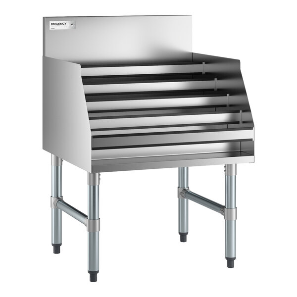 A stainless steel five-tiered display rack with side and back panels, supported by four sturdy legs.