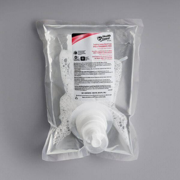 A plastic bag of 6 Kutol Health Guard white bottles with red labels.