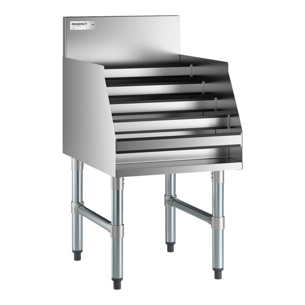 A stainless steel, five-tiered display rack with side panels, a backsplash, and four sturdy legs.
