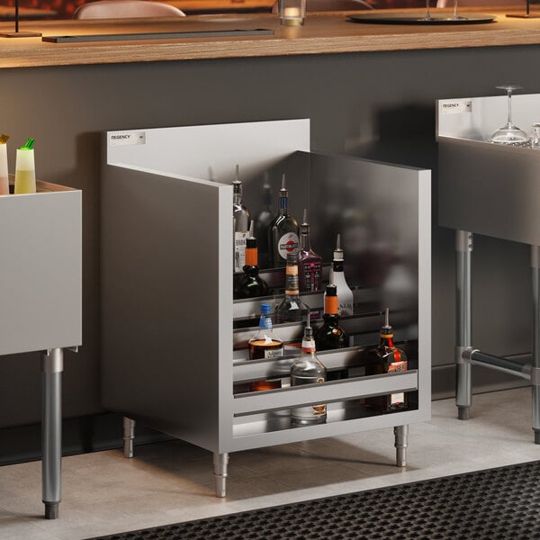 A five-tiered stainless steel liquor display cabinet filled with various bottles, designed for bar or restaurant use.