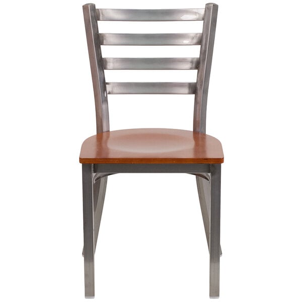 A Flash Furniture metal restaurant chair with a clear-coated wooden seat and back.