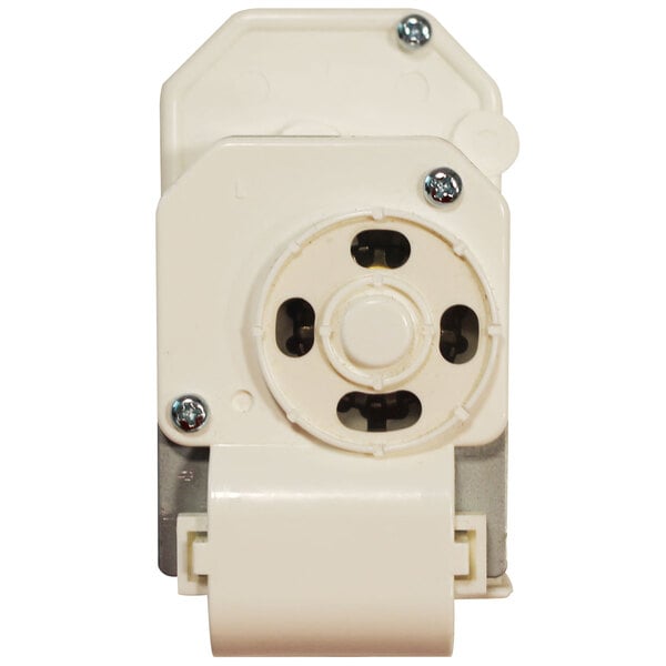 A white plastic Turbo Air defrost timer with a round center.