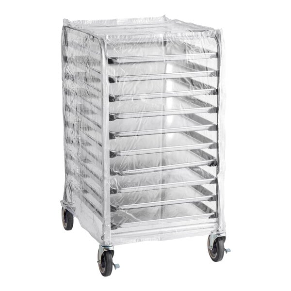 A metal sheet pan rack with ten shelves, covered by a clear plastic cover and equipped with wheels, shown with twelve pans.