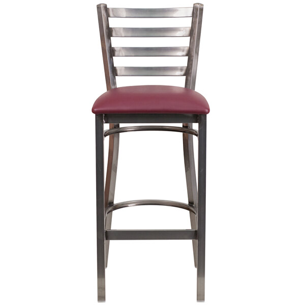 A Flash Furniture metal restaurant barstool with a burgundy vinyl seat.