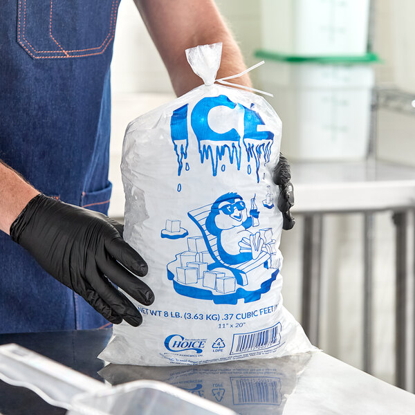 A clear plastic ice bag with a blue ice print design, labeled for 8 pounds of ice.