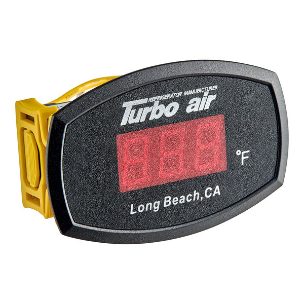 A black and yellow Turbo Air digital temperature gauge with red numbers.