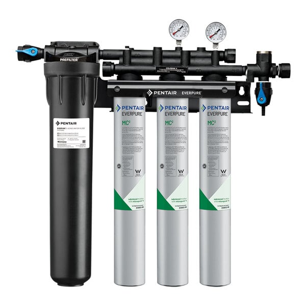 The Everpure Coldrink Triple Water Filtration System with three water filters, a green and white container with a label.