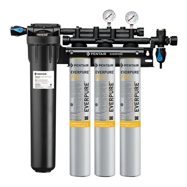 An Everpure water filtration system with three black and silver filters installed.