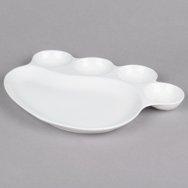 An American Metalcraft porcelain plate with 5 compartments, 4 of which are small bowls.