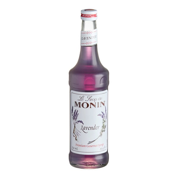 A 750 mL bottle of Monin Premium Lavender Flavoring Syrup.