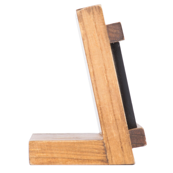 A wooden Cal-Mil Madera stand with a black chalkboard.