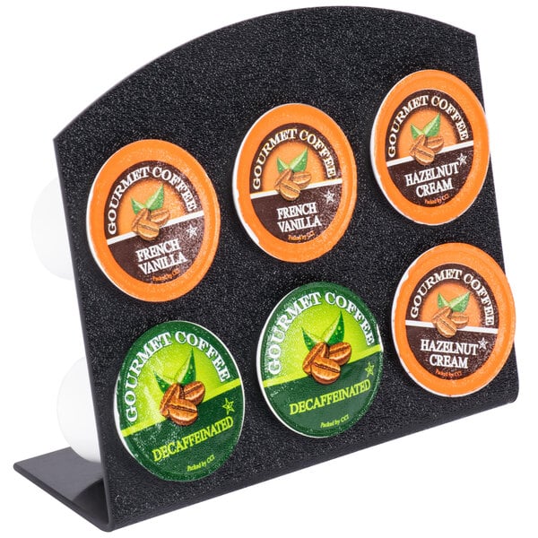 A black Cal-Mil single serve coffee pod holder with 6 round slots.