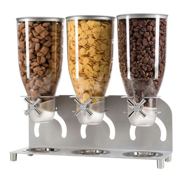A Cal-Mil triple canister cereal dispenser filled with three types of cereal.