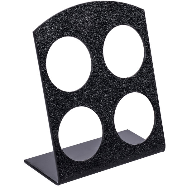 A black plastic stand with four circles.