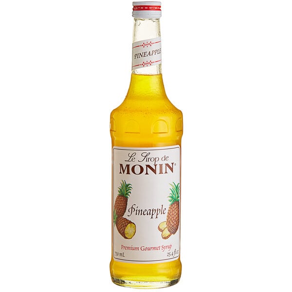 A Monin Premium Pineapple Flavoring syrup bottle.