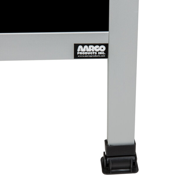 An Aarco aluminum A-frame sign board with black marker boards on a metal stand with a black and white logo.