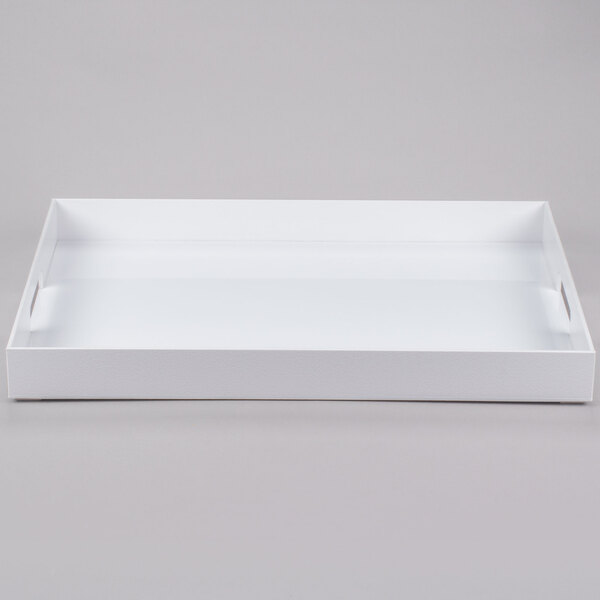 A white rectangular plastic tray with handles.