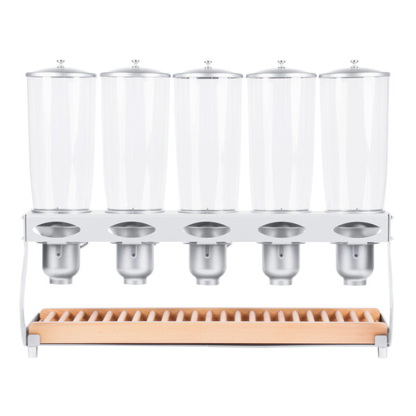 A Cal-Mil beechwood rectangular dispenser with 5 clear canisters on it.