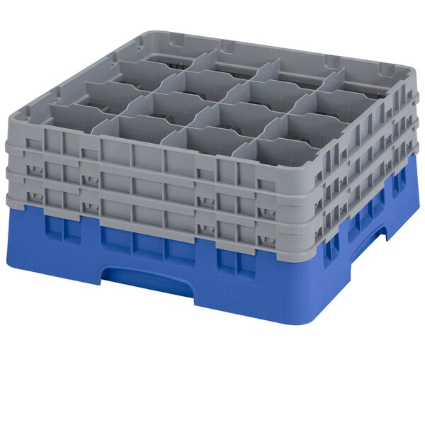 A blue plastic Cambro glass rack with 16 compartments.