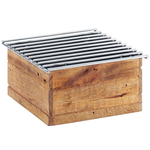 A wooden box with metal grates on top.