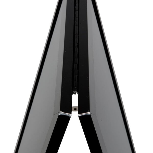 An Aarco black aluminum A-frame sign board with black marker board on display.