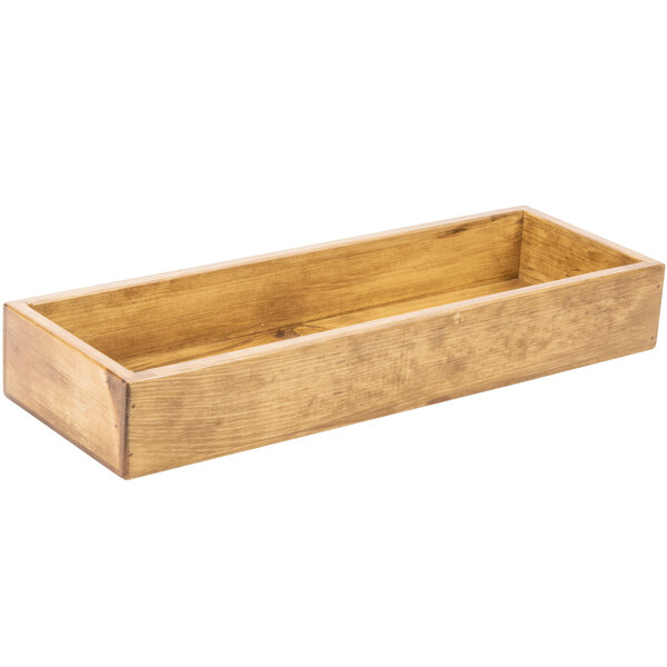 A wooden rectangular plate riser with a rectangular bottom.