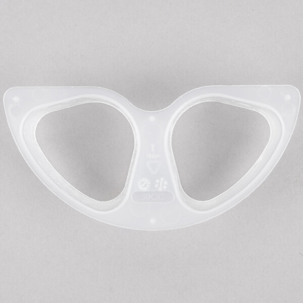 A white plastic triangle-shaped object with two holes.