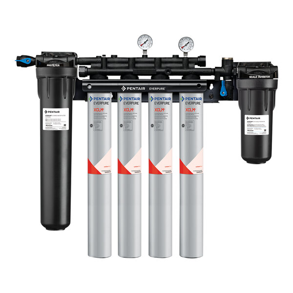 A group of Everpure water filters including a pre-filter and scale reduction filter.